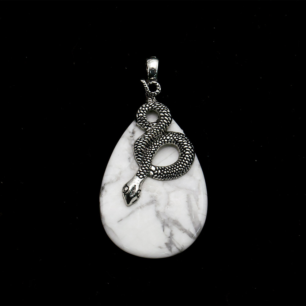 Фото товара кулон из кахолонга "змея на камне" 68*35 мм