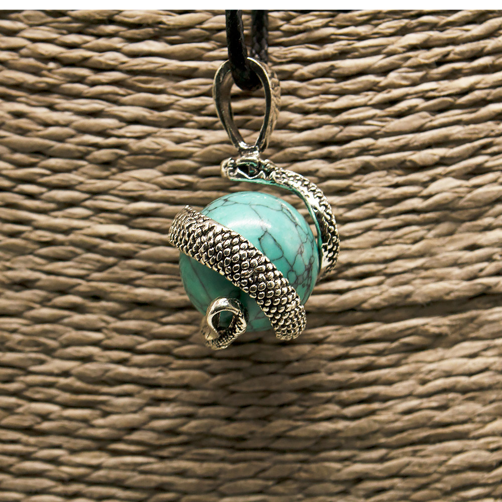 Фото товара кулон  "змея на шаре" говлит