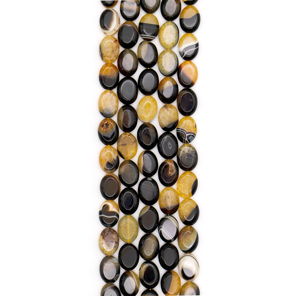 Фото товара агат черный с кварцем тонированным желтым таблетка 20*15 мм