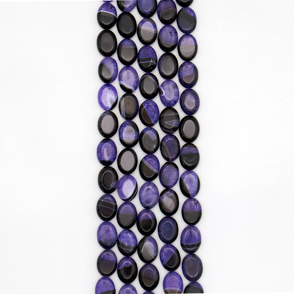 Фото товара агат черный с кварцем тонированным фиолетовым таблетка 20*15 мм