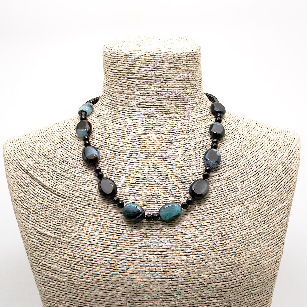 Фото товара бусы из агата с кварцем тонированным голубым таблетка овальная 20*15 мм