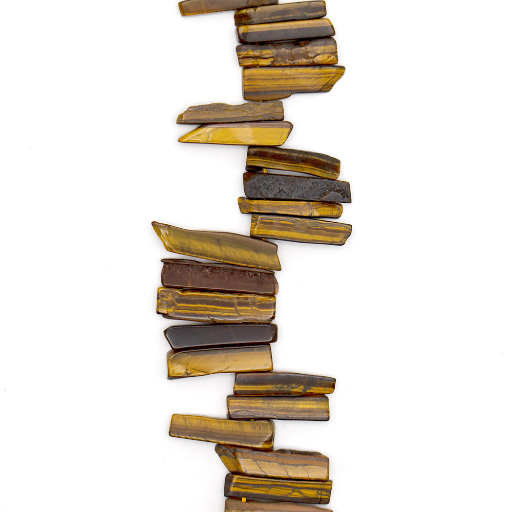 Фото товара тигровый глаз пластины на увеличение от 32*10 до 53*10 мм