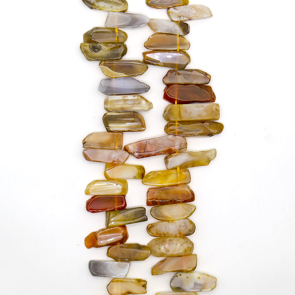 Агат ботсвана пластины цвет медовый  на увеличение от 32*10 до 53*10 мм
