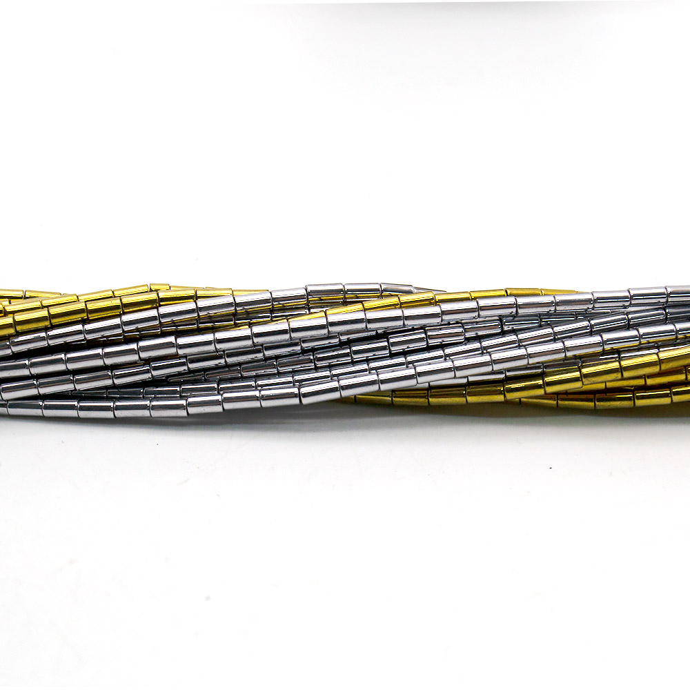 Фото товара гематит с покрытием золото цилиндр