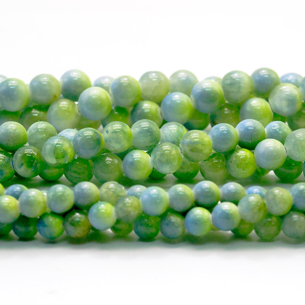 Фото товара кальцит пигментированый зелено-голубой микс шар