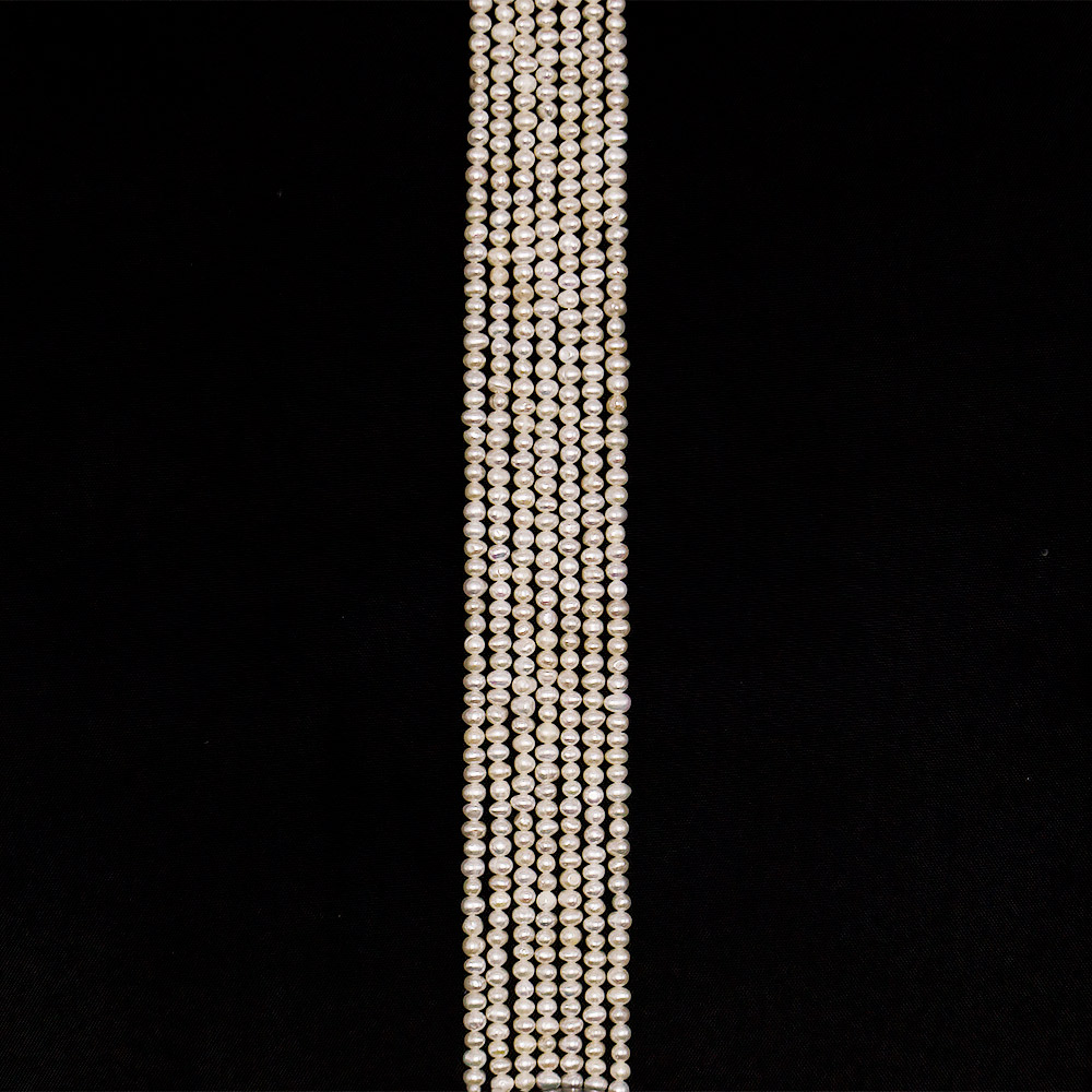 Жемчуг белый 4,5*3,5 мм