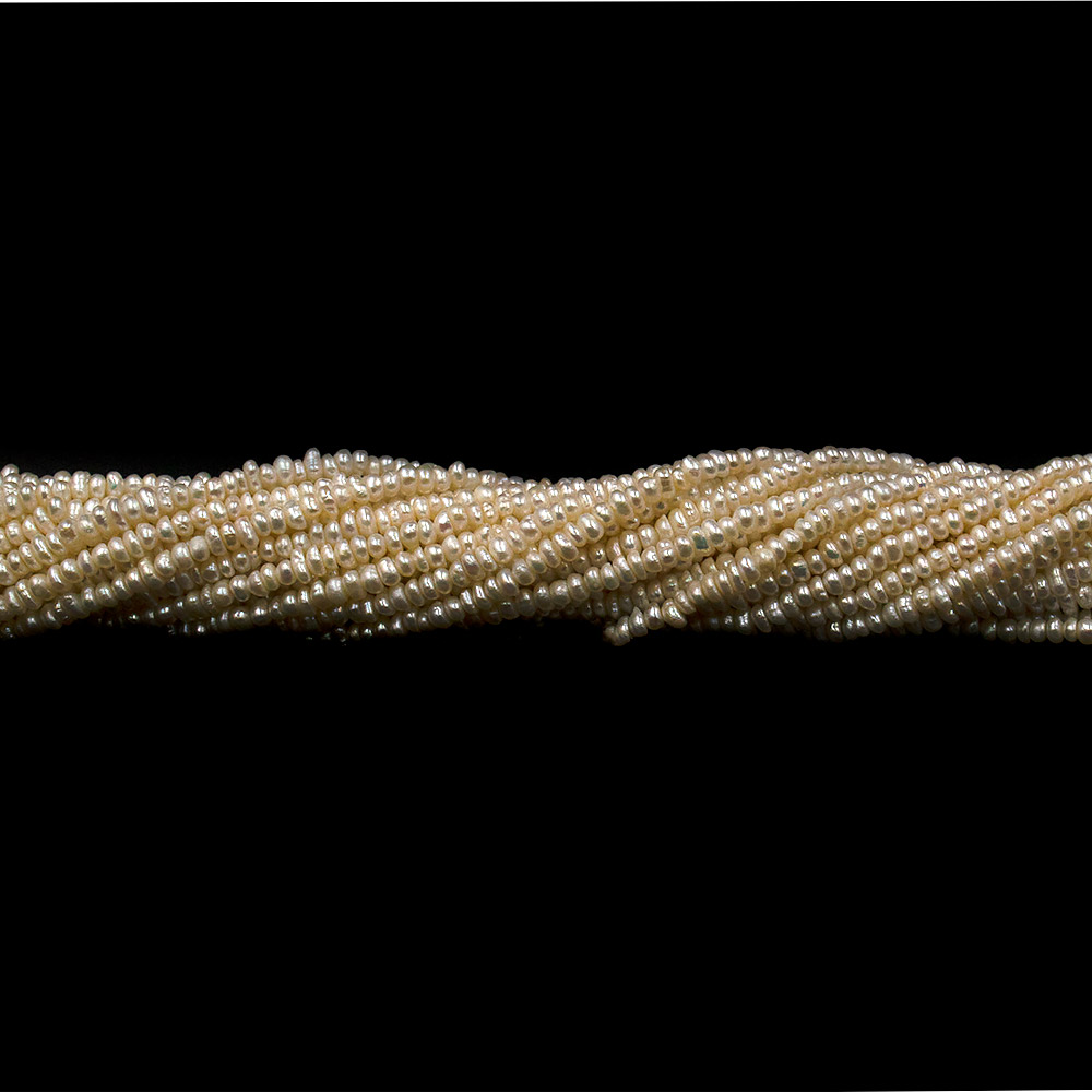 Фото товара жемчуг белый слайс 2*3 мм