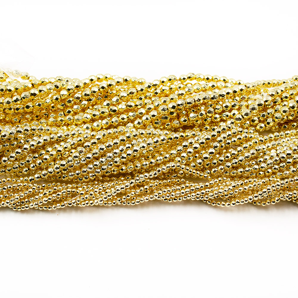 Фото товара гематит с покрытием яркое золото шар грань