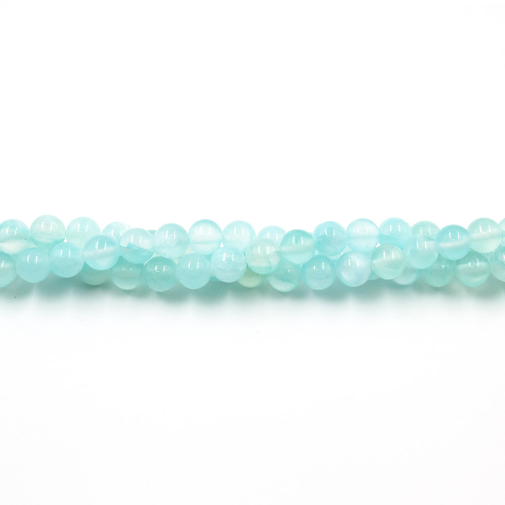 Фото товара кальцит тонированный цвет лазурный  8 мм