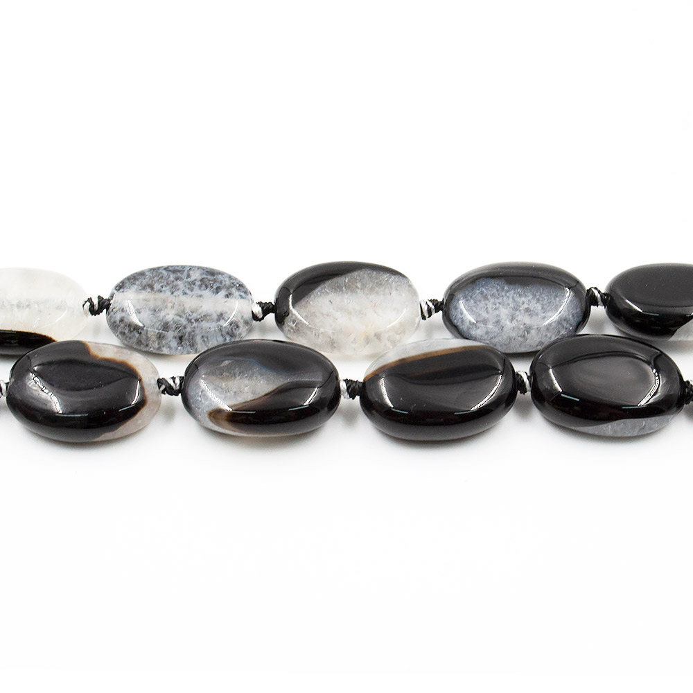 Фото товара агат черный с кварцем белым таблетка овальная плоская 25*18 мм