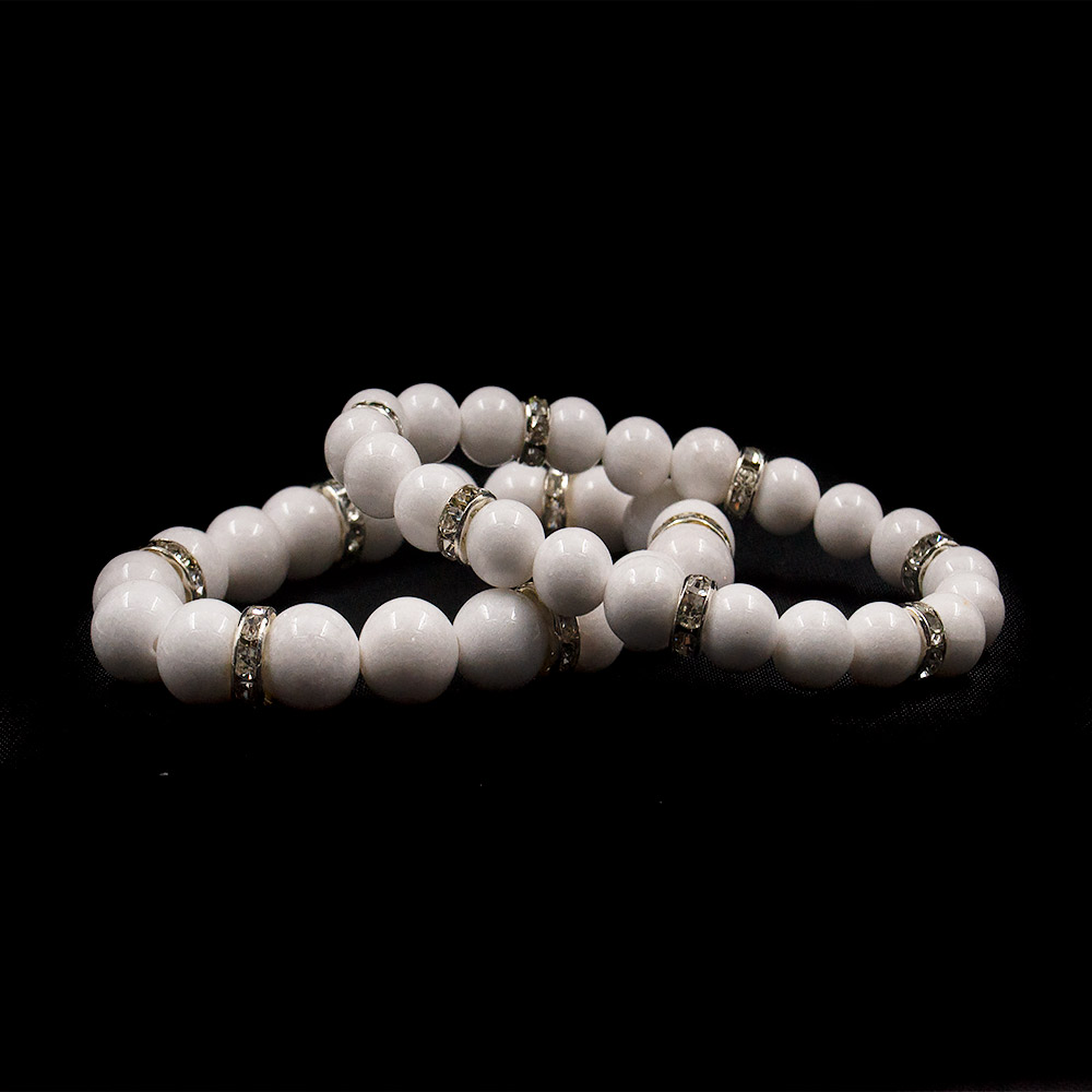 Фото товара браслет из кахолонга белого с фурнитурой "стразы" шар