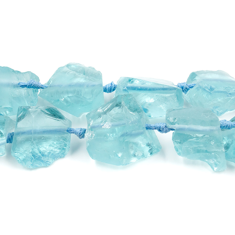 Фото товара аквакварц яркий галтовка необработанная 25*20 мм