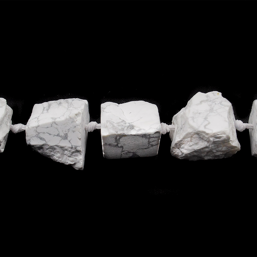 Кахолонг галтовка необработанная 28*18 мм