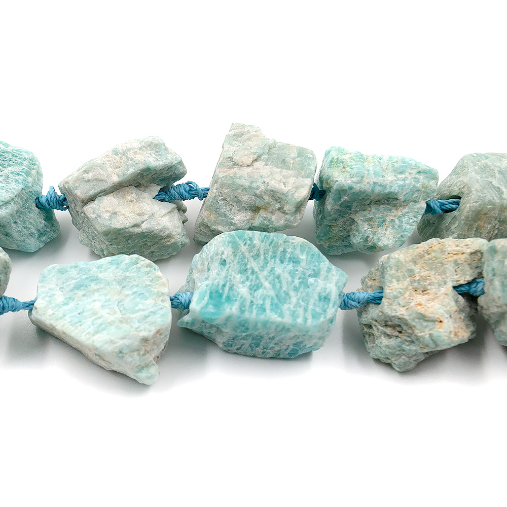 Фото товара амазонит яркий галтовка необработанная на увеличение от 20*15 до 27*20 мм