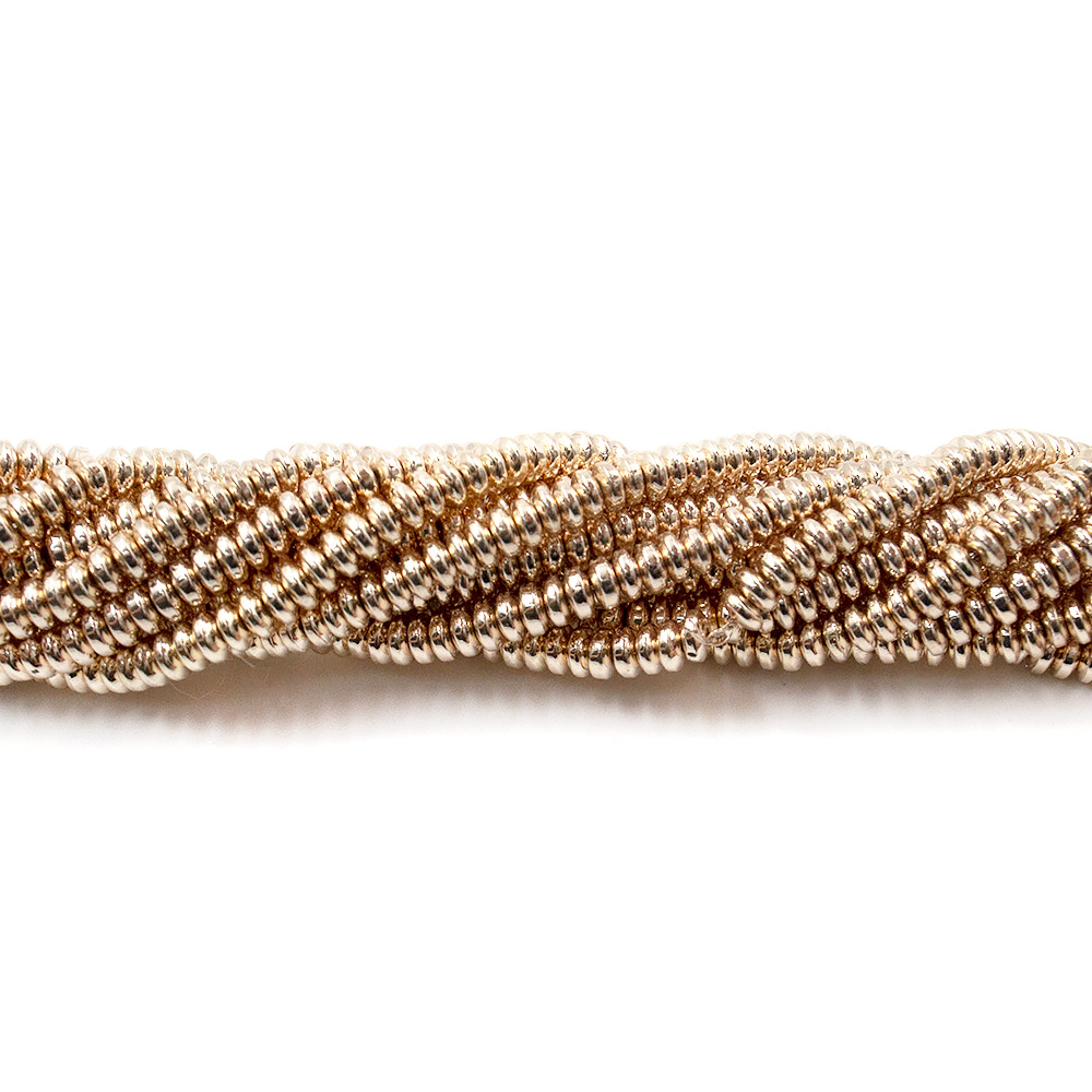 Фото товара гематит с покрытием бежевое золото разделитель диск 4*2 мм