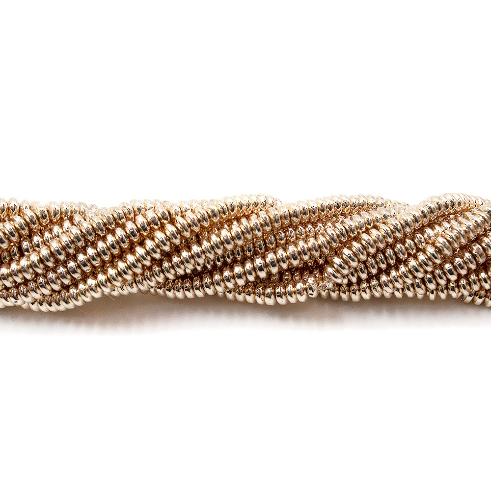 Фото товара гематит с покрытием бежевое золото разделитель диск 4*2 мм