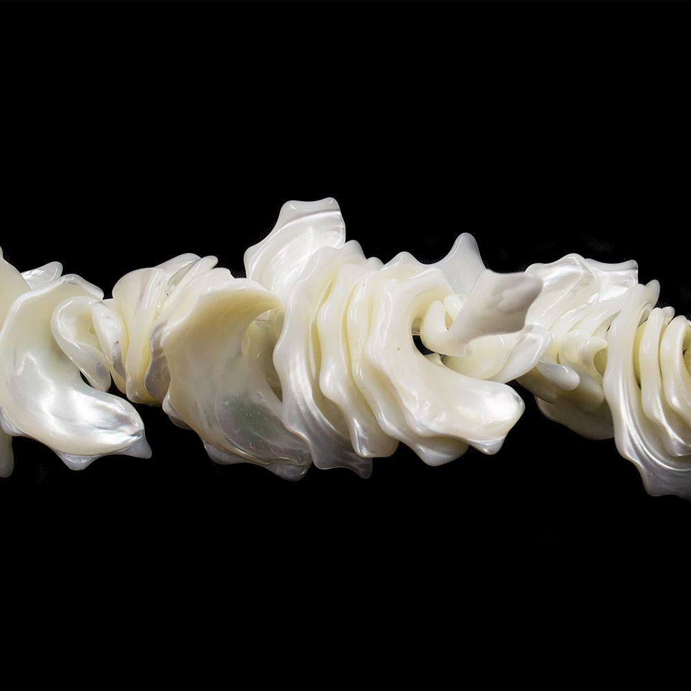 Фото товара перламутр молочный формы ракушка