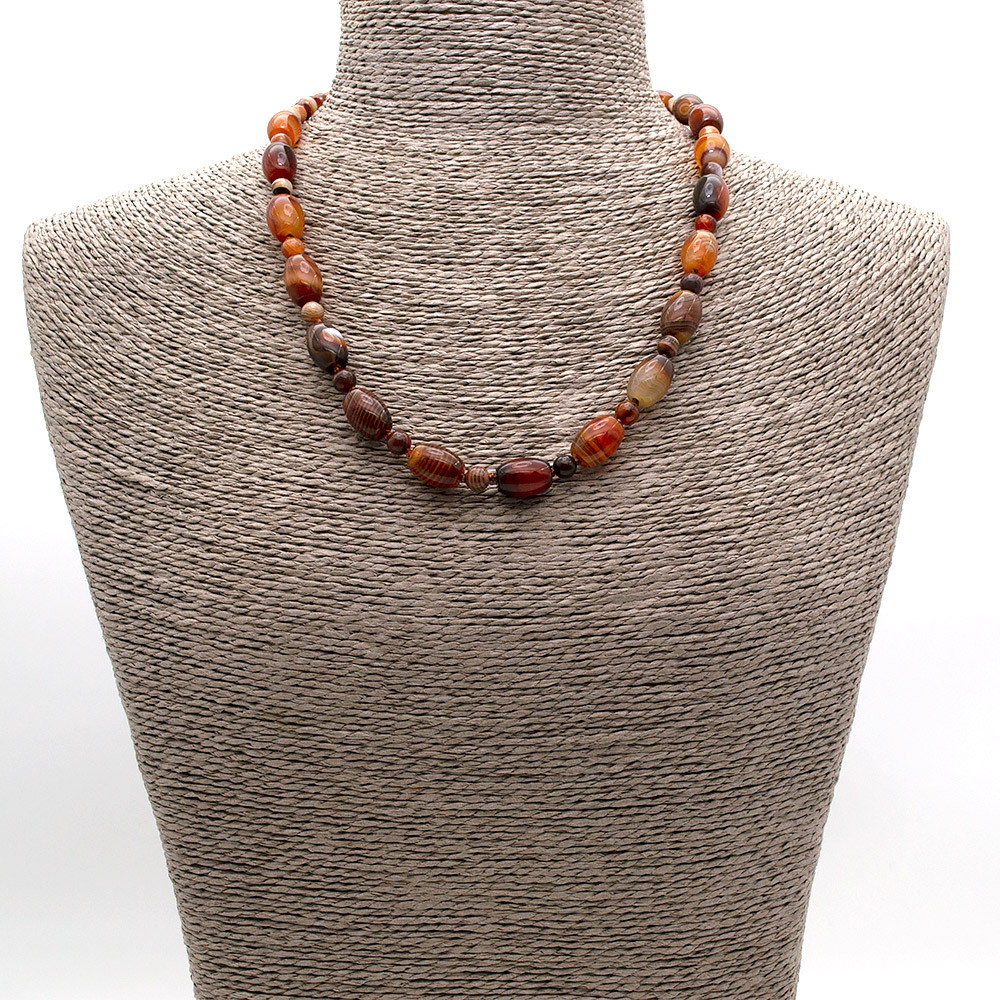 Фото товара бусы из сердолика темного бочонок