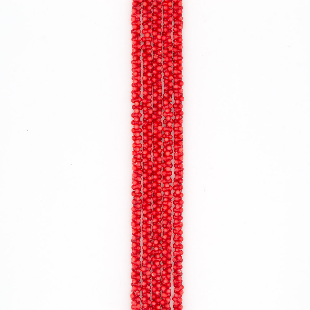 Фото товара коралл тонированный кораллово-розовый "кости" 4*8 мм