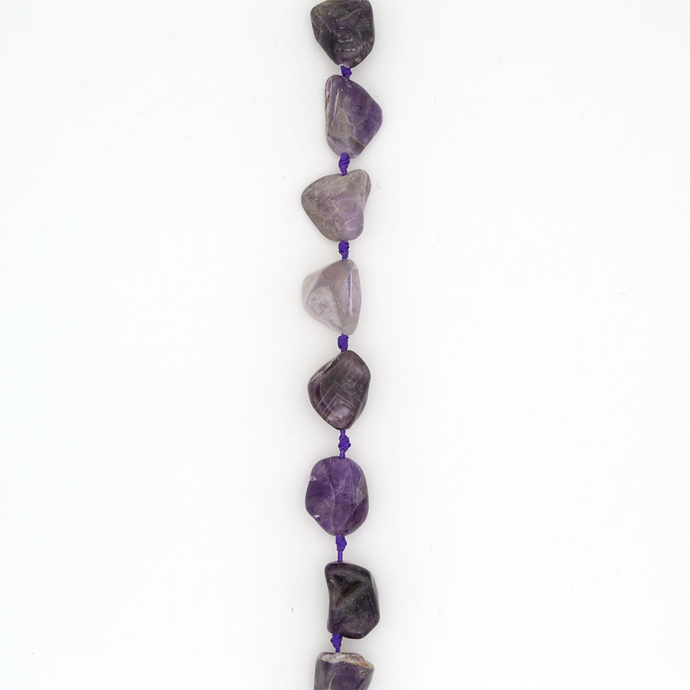 Фото товара аметист темный галтовка 34*20 мм