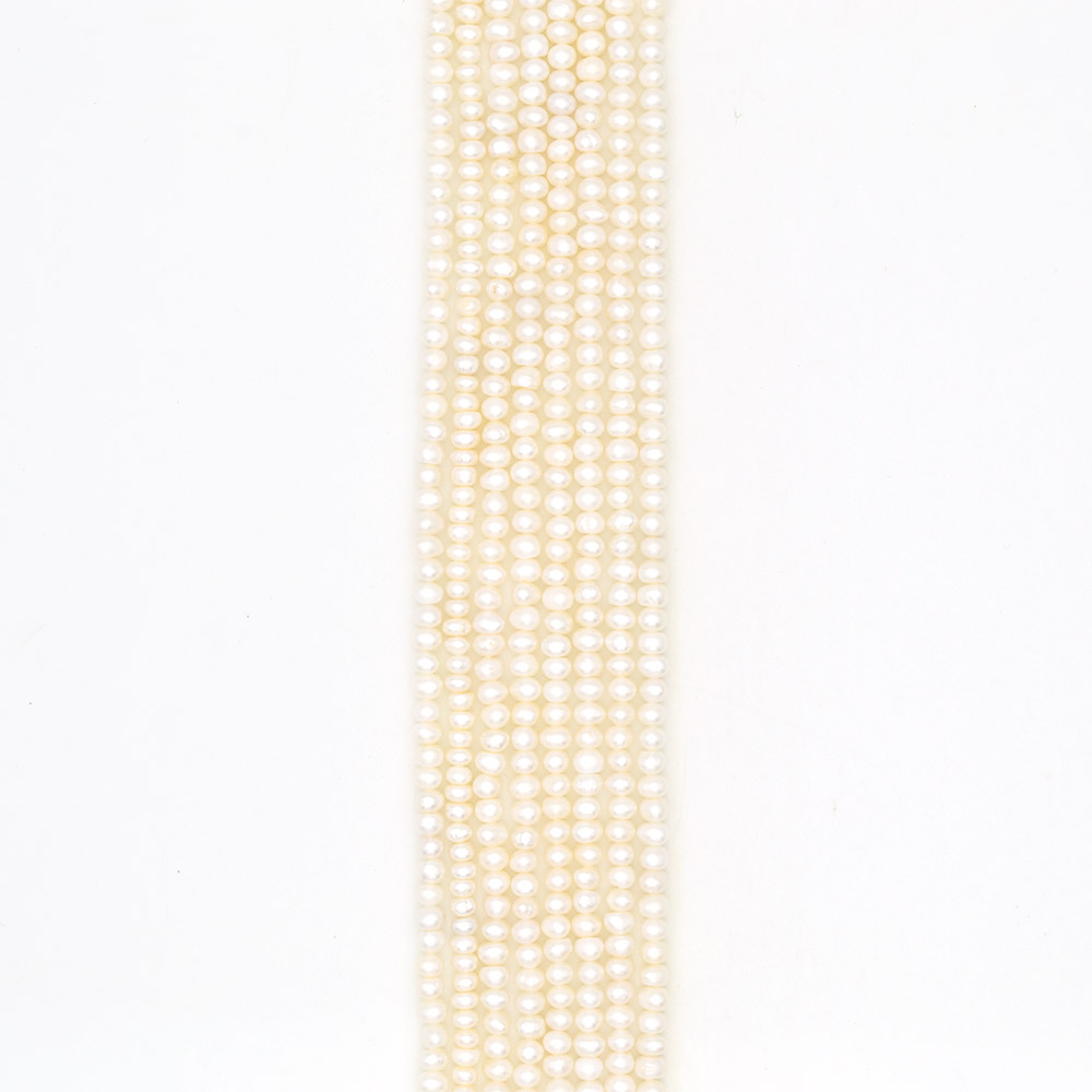 Фото товара жемчуг белый "пуговица" 6*5 мм