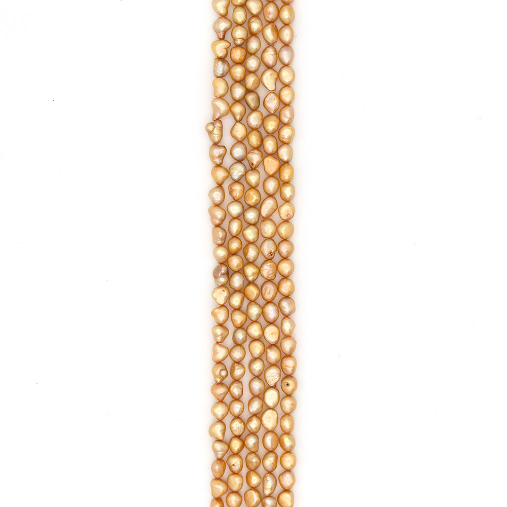 Фото товара жемчуг цвет золото "рис" 10*8 мм