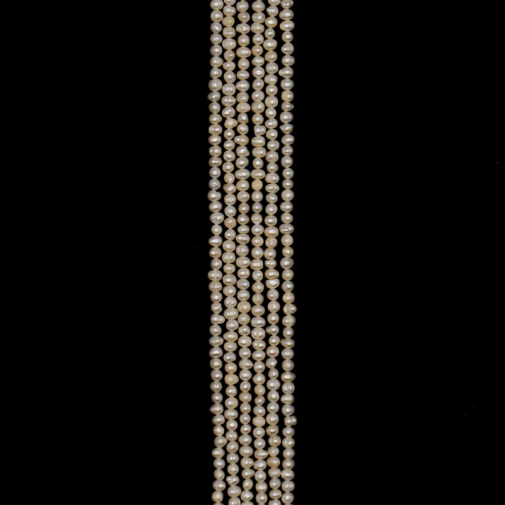 Фото товара жемчуг белый "пуговица" 5*8 мм