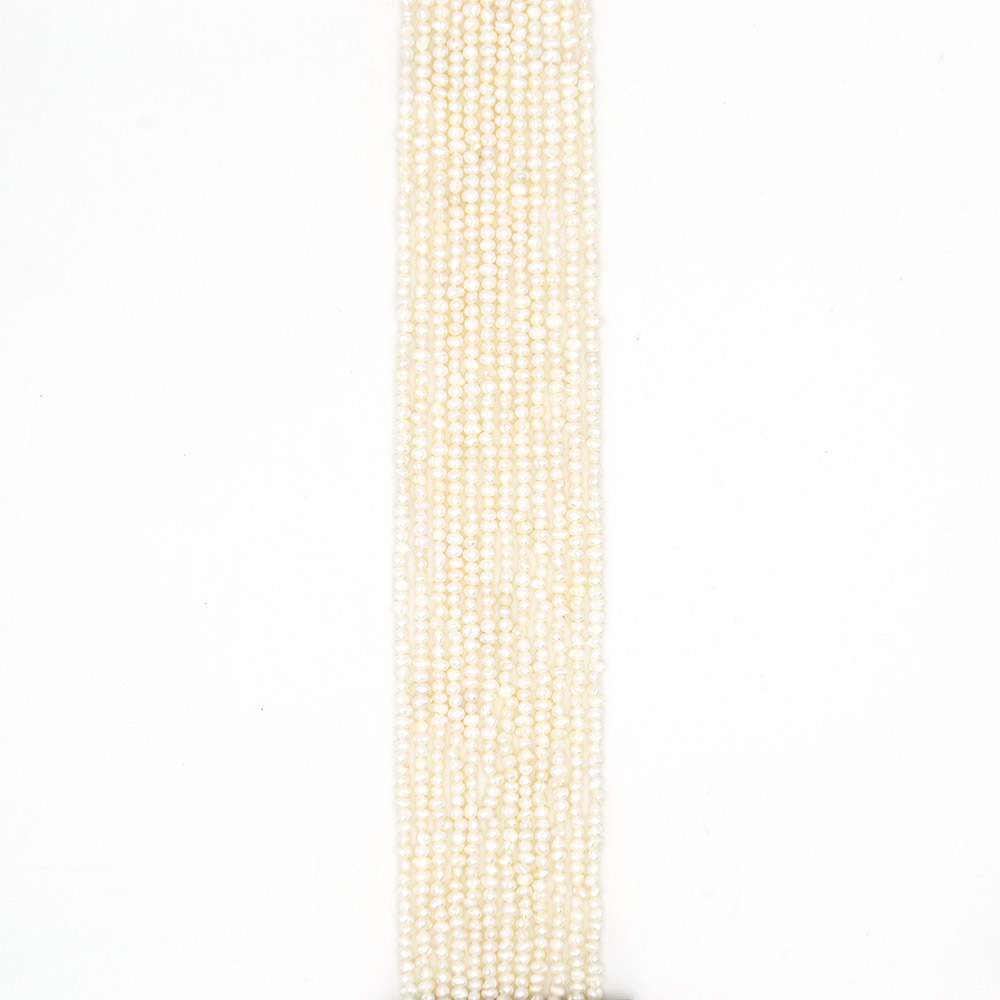 Фото товара жемчуг белый "пуговица" 3*4,5 мм