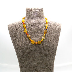 Фото товара бусы из агата тонированного оранжевого таблетка 20*15 мм