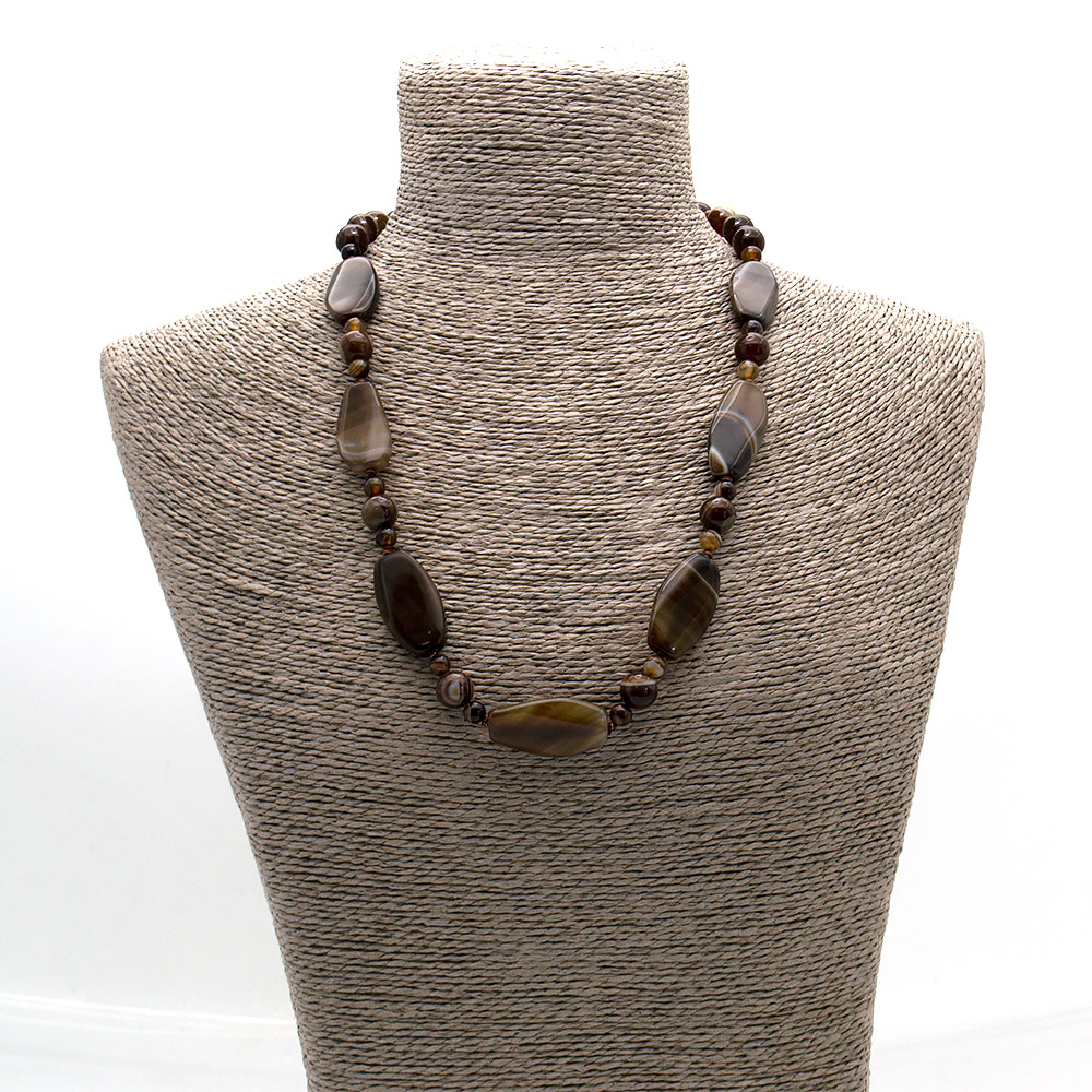 Фото товара бусы из агата коричневого таблетка скошенная 32*18 мм