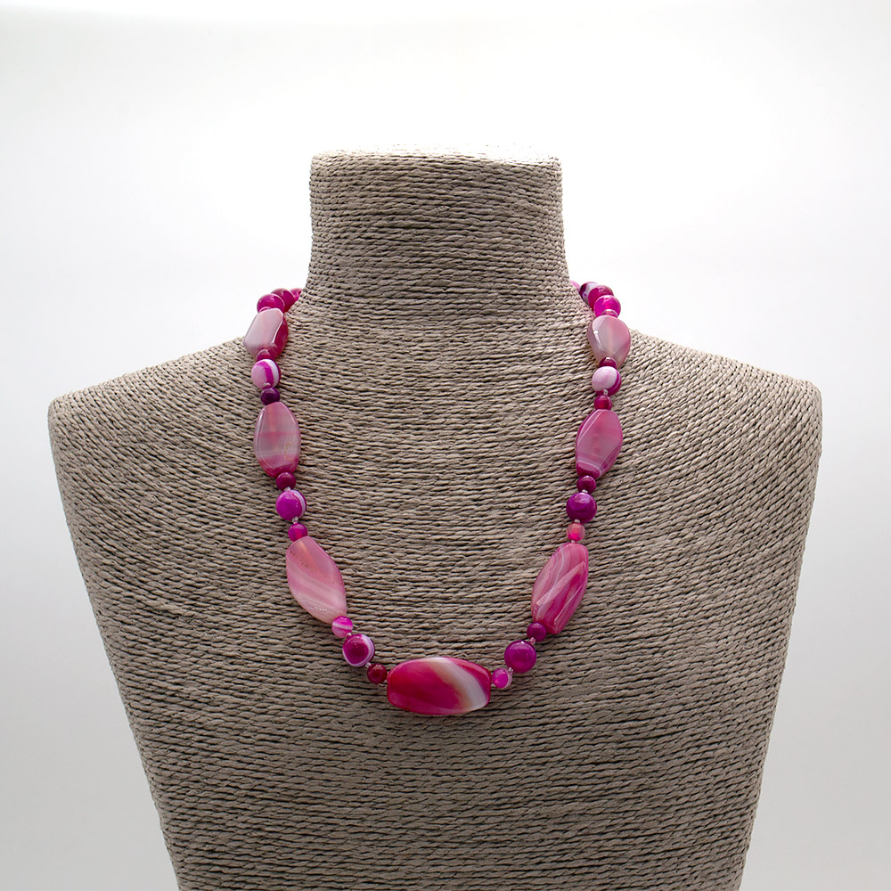 Фото товара бусы из агата тонированного светло-розового таблетка 30*17 мм скошенная