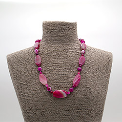 Бусы из агата тонированного светло-розового таблетка 30*17 мм скошенная