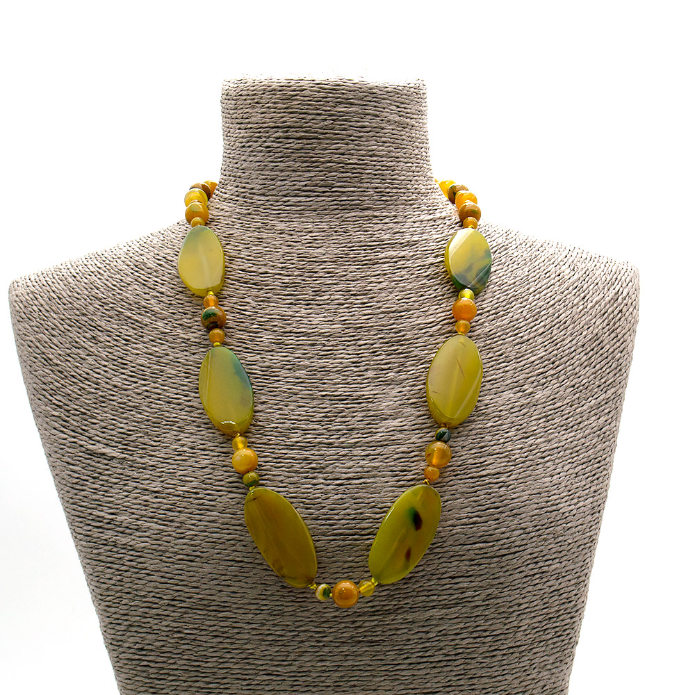 Фото товара бусы из агата цвет желто-зеленый таблетка витая 39*20 мм