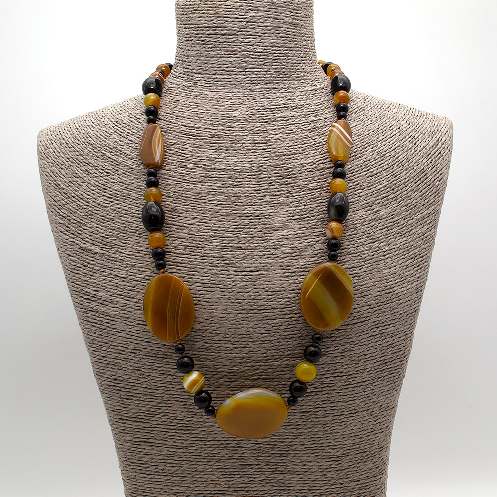 Фото товара бусы из агата цвет медовый таблетка витая