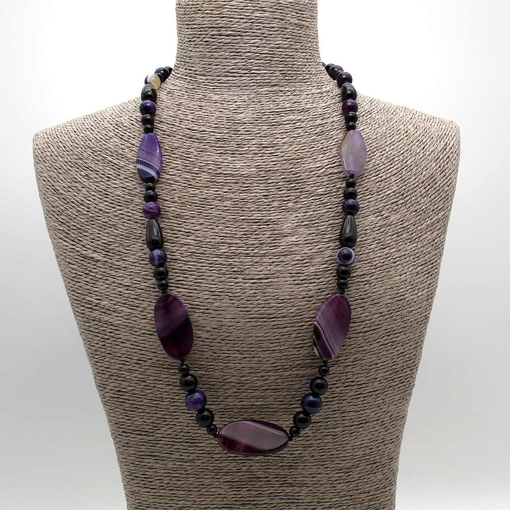 Фото товара бусы из агата фиолетового таблетка витая