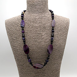 Фото товара бусы из агата фиолетового таблетка витая