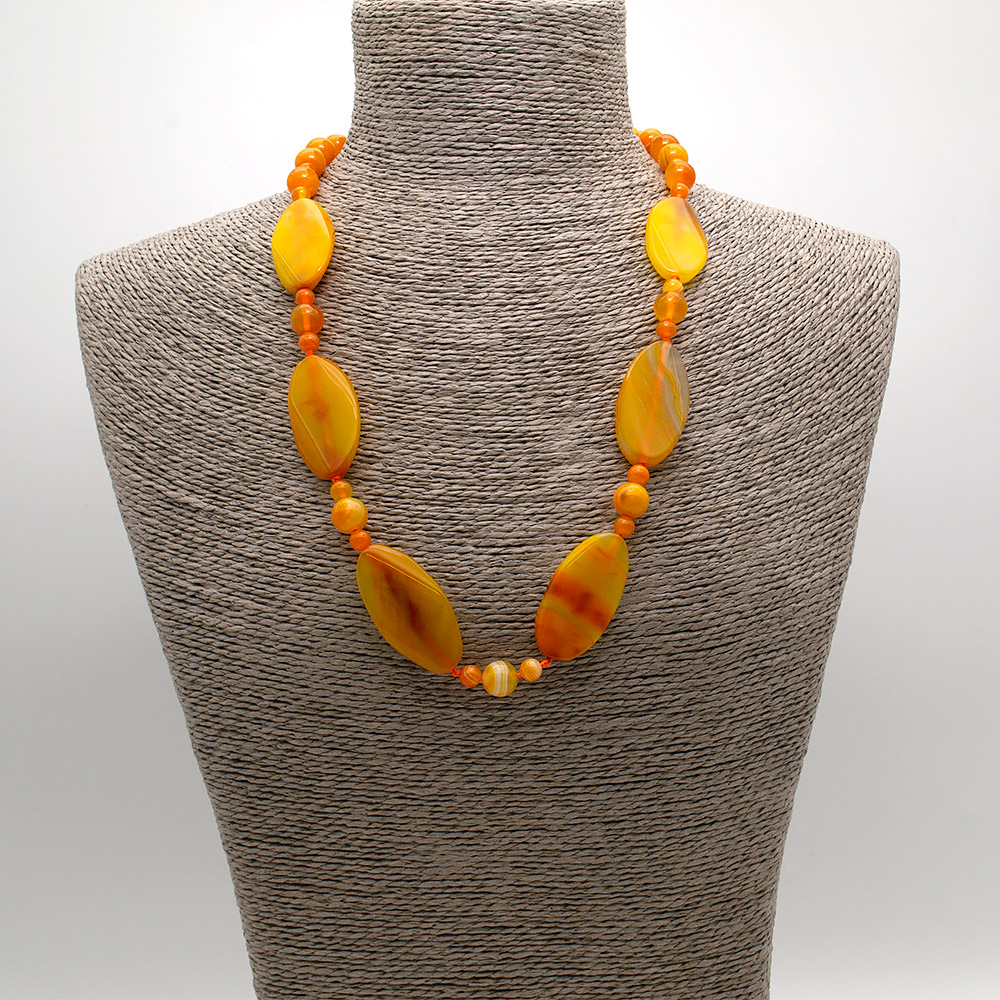 Фото товара бусы из агата тонированного оранжевого таблетка витая 40*20 мм