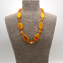 Бусы из агата тонированного оранжевого таблетка витая 40*20 мм