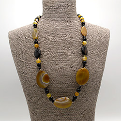 Фото товара бусы из агата цвет медовый таблетка