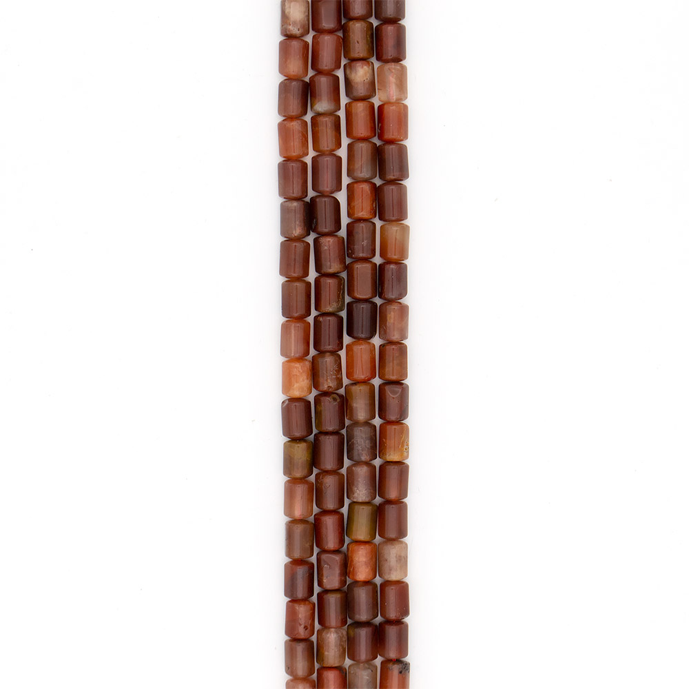 Фото товара агат цилиндр ботсвана медовый темный трехсторонний 13*10 мм