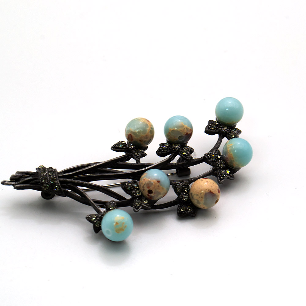 Фото товара брошь "ветка 7 шариков" варисцит