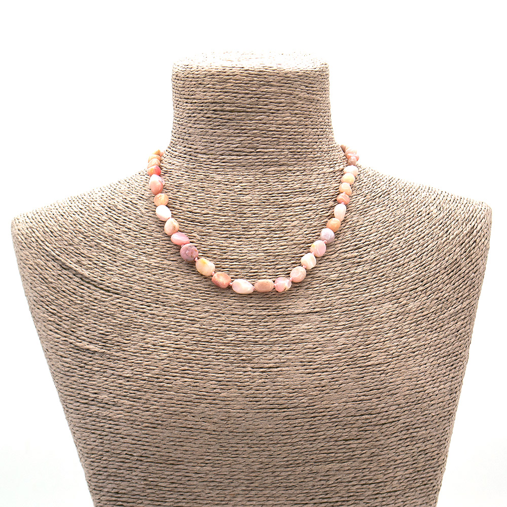 Фото товара бусы из опала розового галтовка