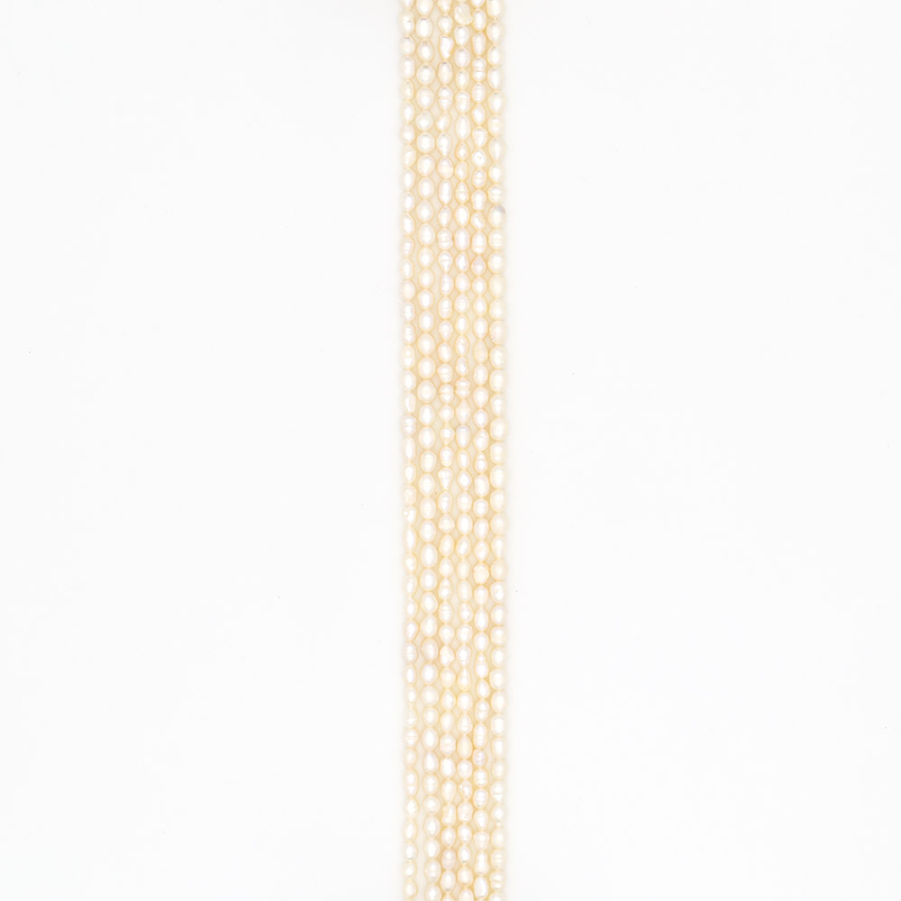 Фото товара жемчуг белый "рис" 6,5*5 мм