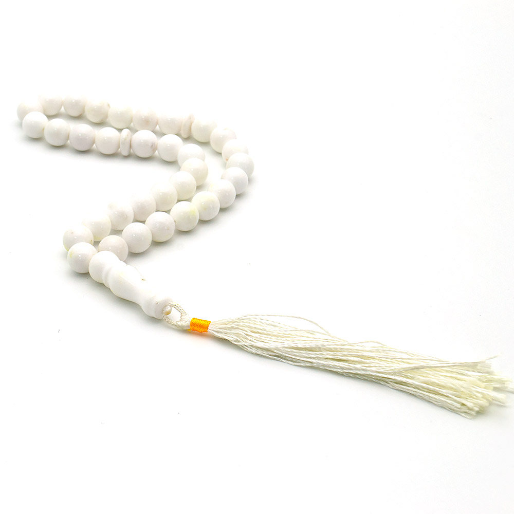 Фото товара четки из кахолонга белого 12 мм 33 бусины