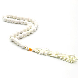 Четки из кахолонга белого 12 мм 33 бусины