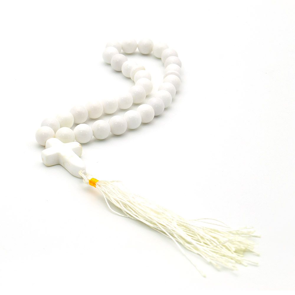Фото товара четки с крестом из кахолонга белого 10 мм 30 бусин