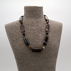 Фото товара бусы из агата тонированного коричневого прямоугольник 40*17 мм