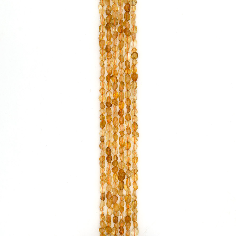 Фото товара кварц рутиловый желтый галтовка 6*8 мм