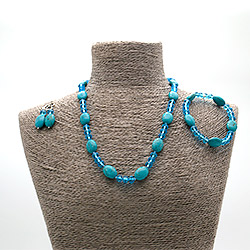 Бусы,браслет,серьги из говлита тонированного с цирконом