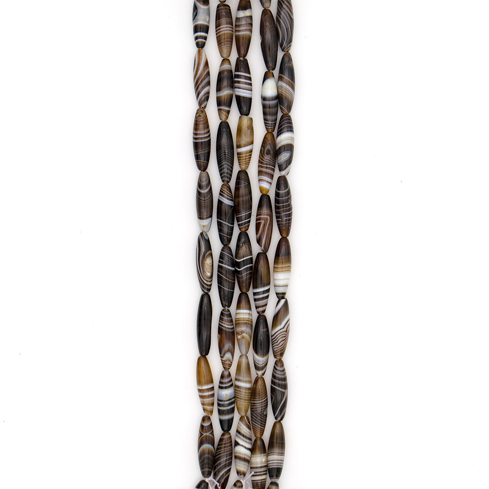 Фото товара агат бочата цвет коричнево-белый 30*8 мм